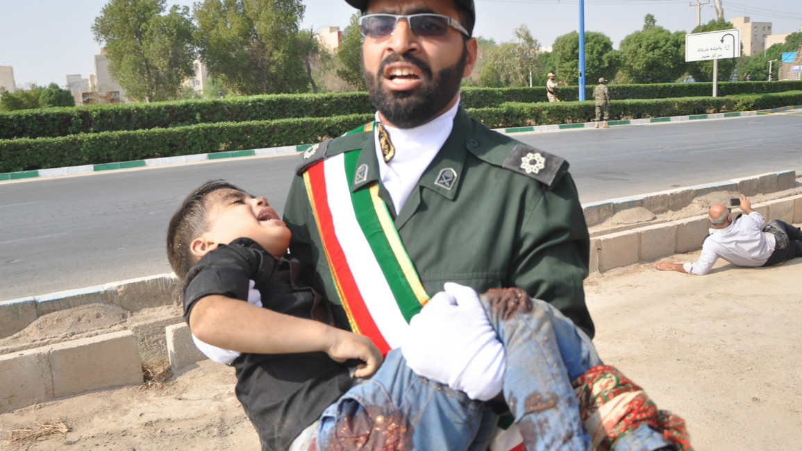 Boy iran parade -- AFP