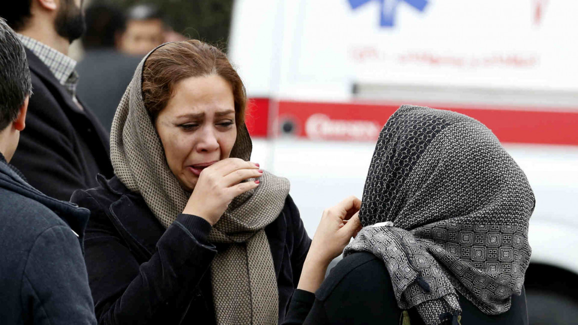  Mouring relatives of the downed Aseman Airlines flight