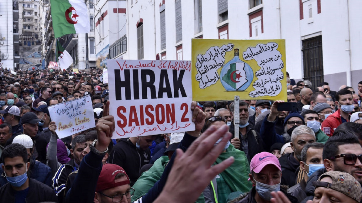 Algerian anti-government protesters [GETTY] 