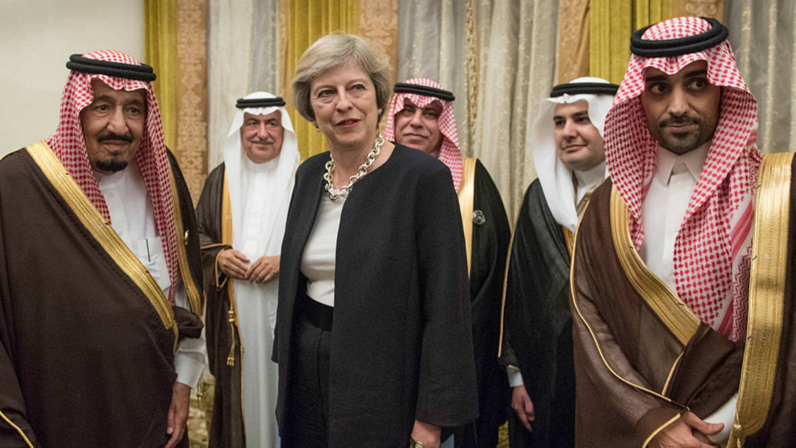 Saudis and Theresa May - Getty