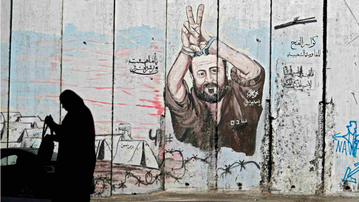 Graffiti on Israel's separation barrier depicting Marwan Barghuti 