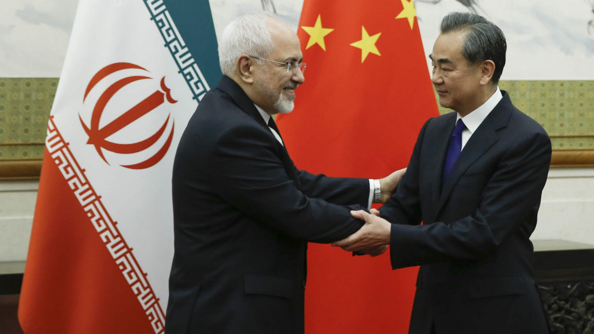 China's state councillor greets Iran FM