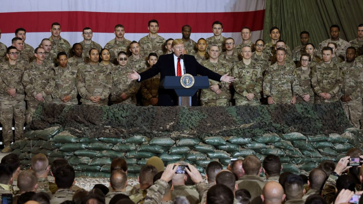 Trump and troops in Afghanistan - Getty