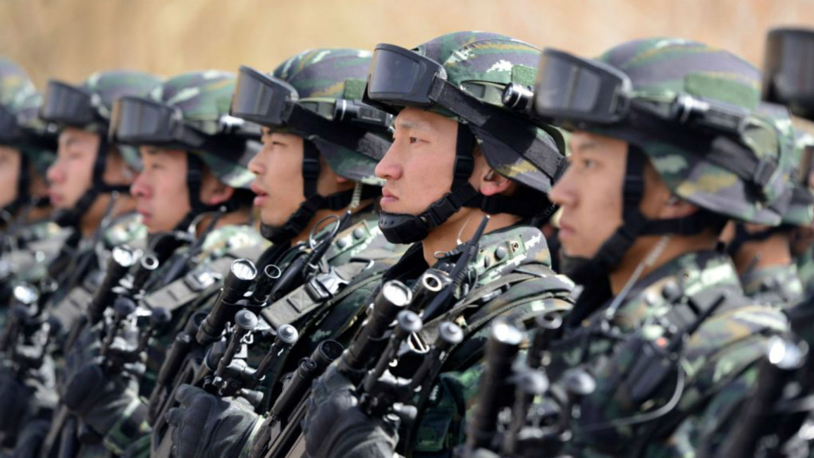 China police Xianjiang - AFP