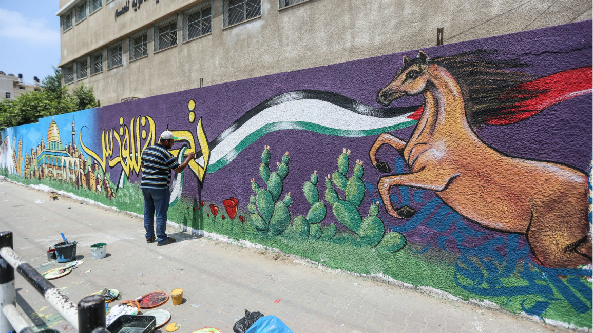 Mural painting in Gaza in solidarity with Jerusalem [Anadolu]