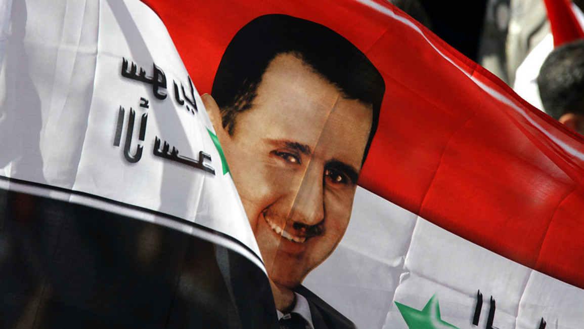 Assad flag support