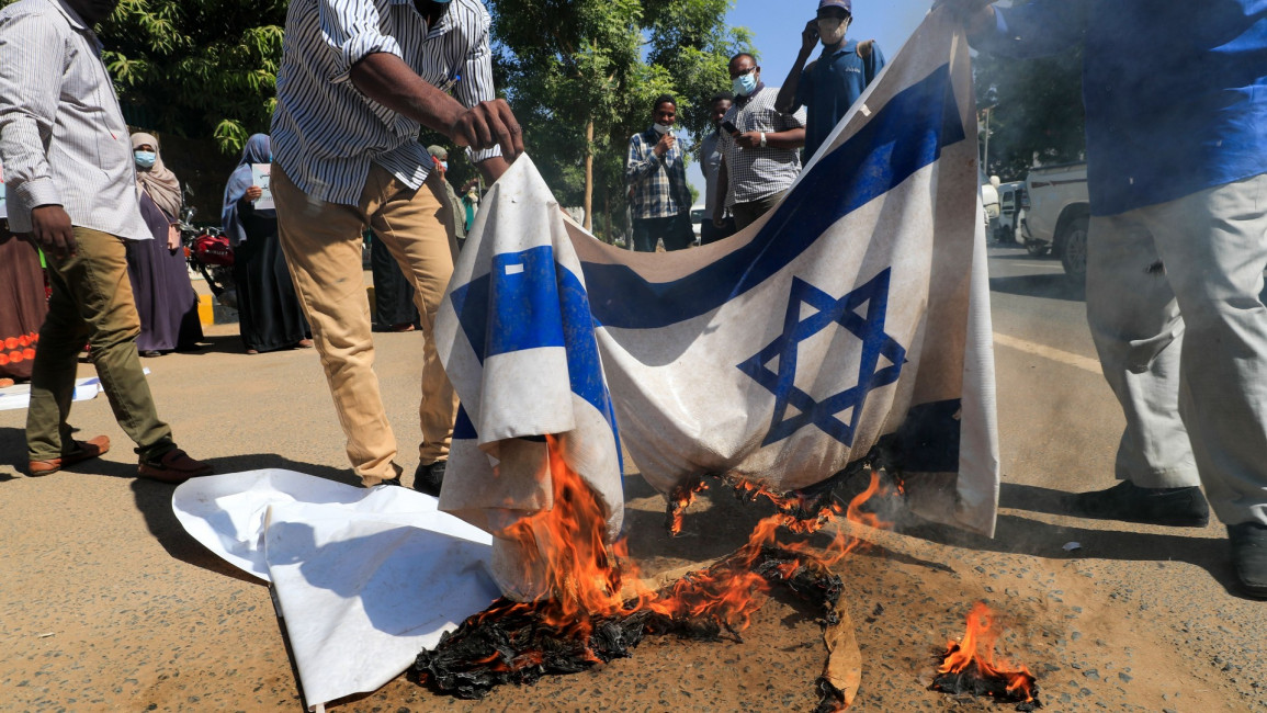 Sudan Israel flag protest burning getty