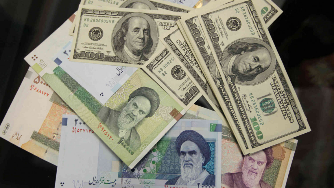 Iranian rial and US dollars