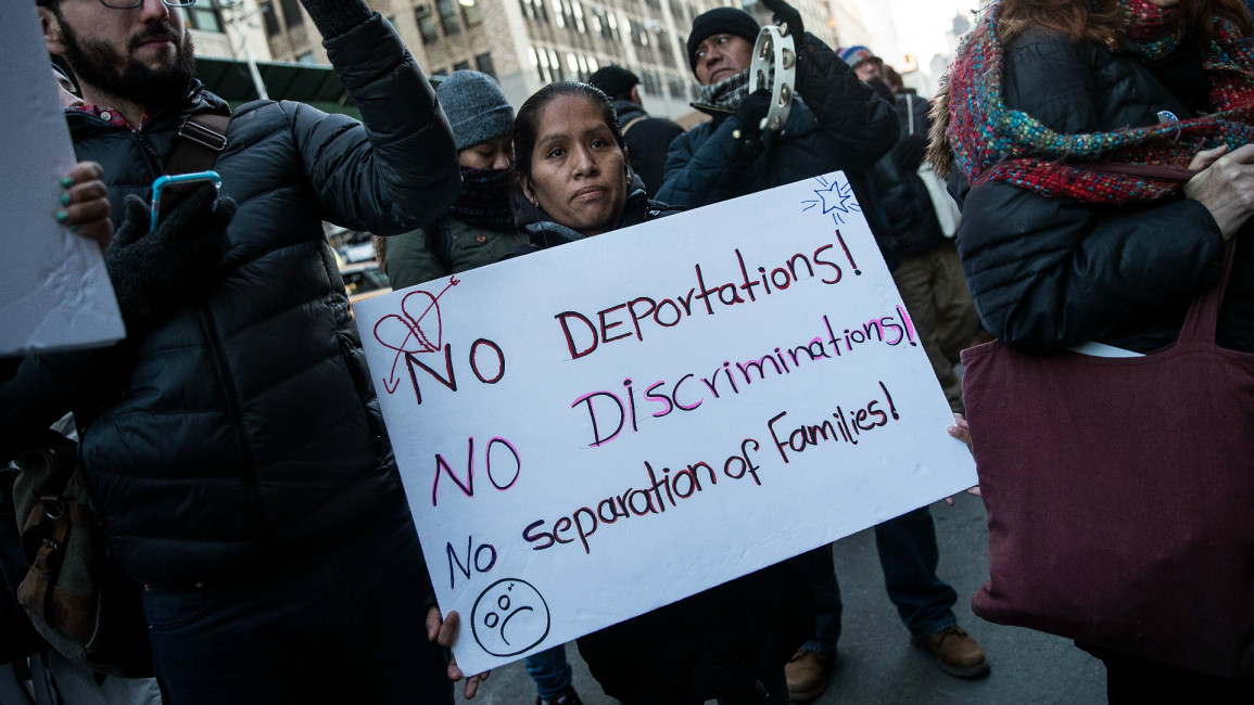 Immigrants and their supporters rally -- Getty