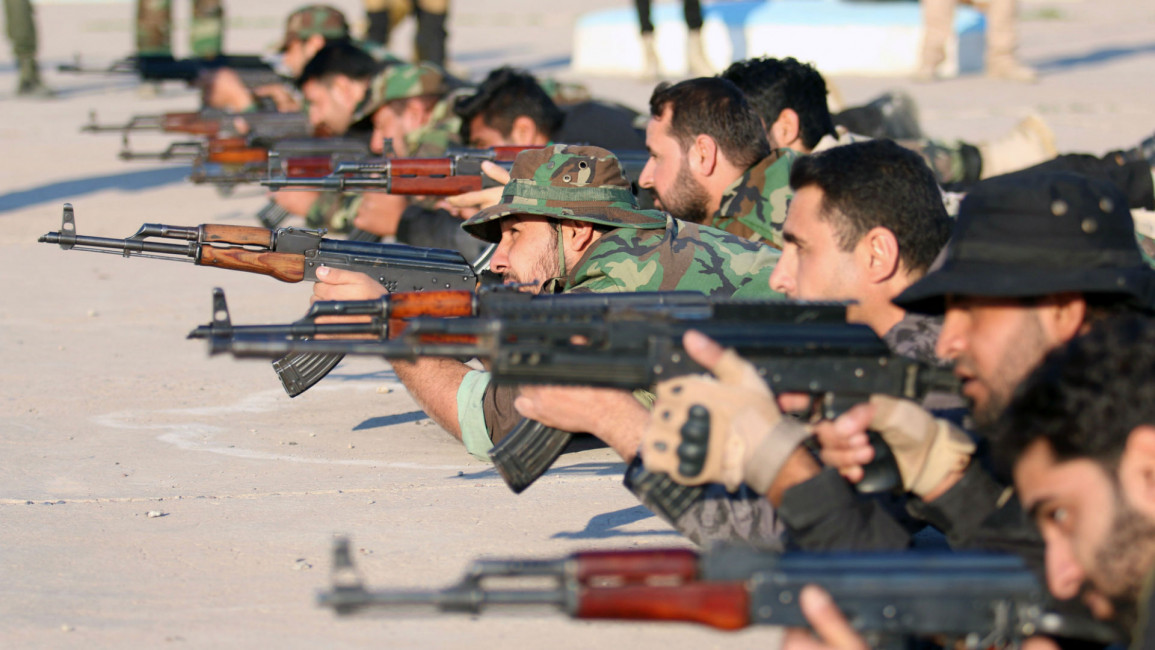 Shia militas hashd al-Shaabi Iraq getty