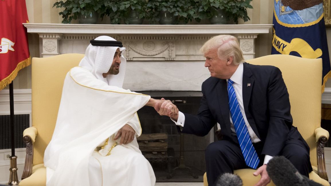 Trump and Mohammed Bin Zayed shake hands. [Getty]