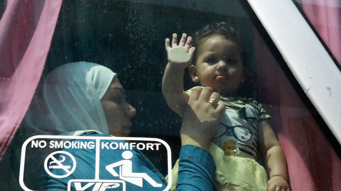Syria returnees from Lebanon - AFP