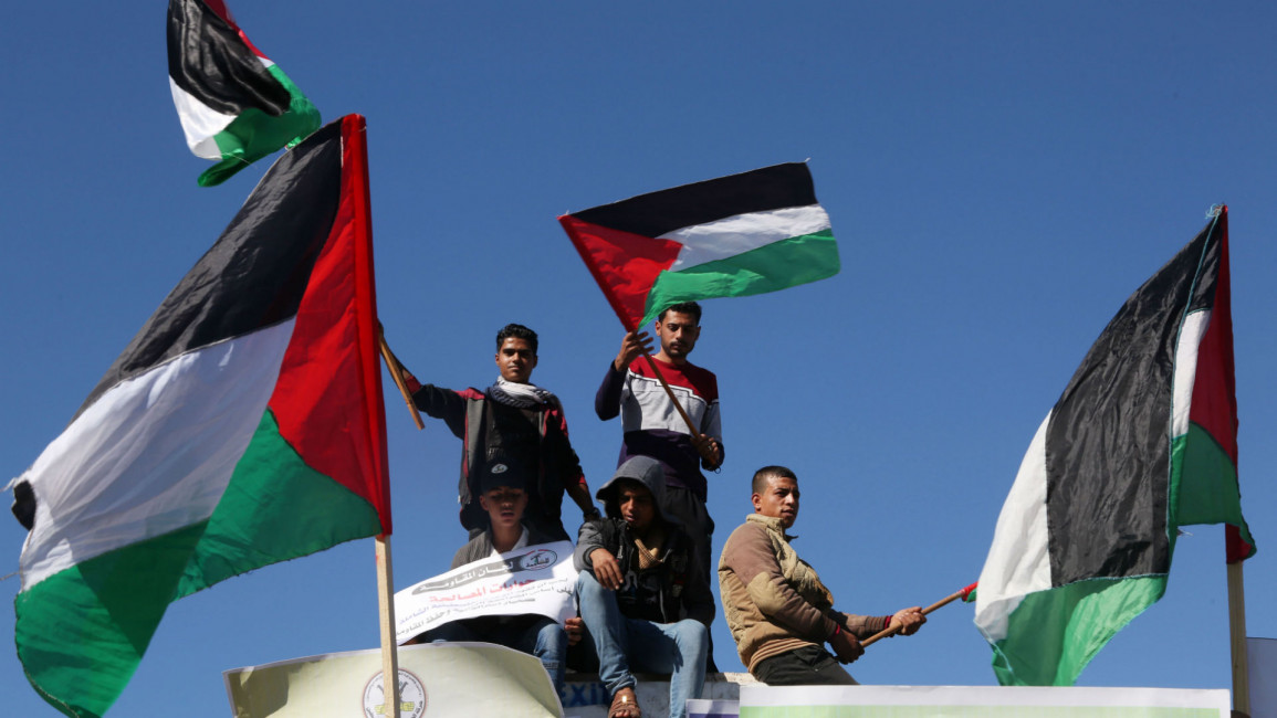 Palestinians rally for reconciliation in Gaza [Getty]