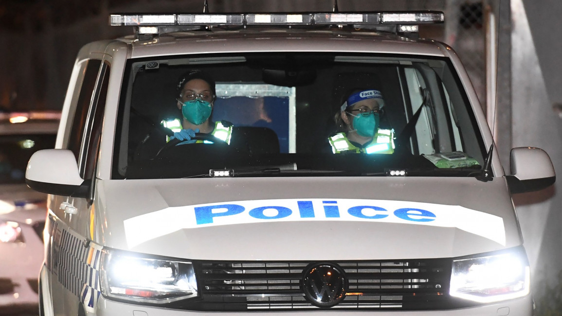 A police van leaves Melbourne Airport as Malka Leifer