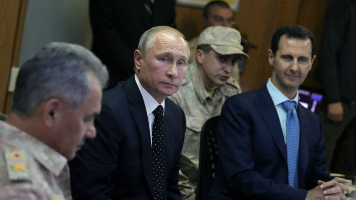 Putin and Assad - Getty