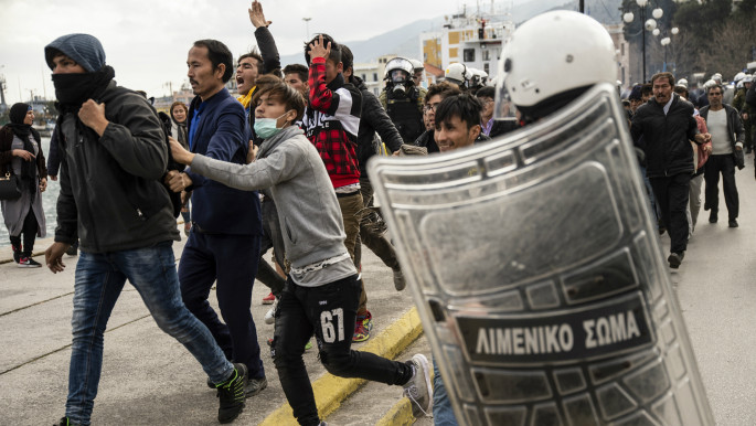 Refugees and riot police clash as tensions reach boiling point on Greek Islands