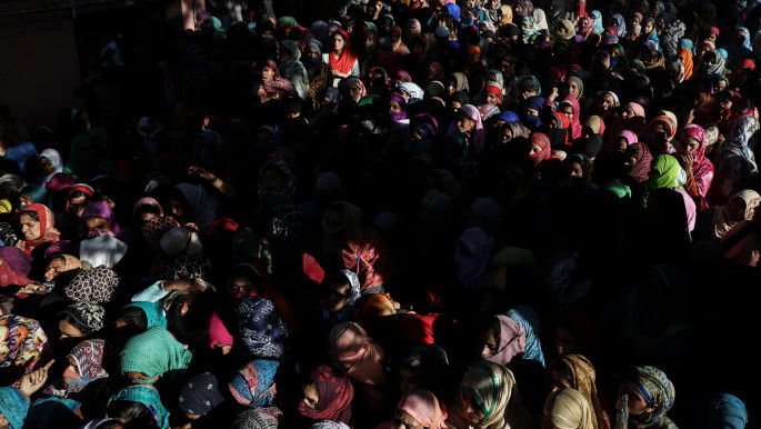 Kashmiri women during a funeral of civilian Shahid Ashraf Dar at Arihal village in Indian-administered Kashmir